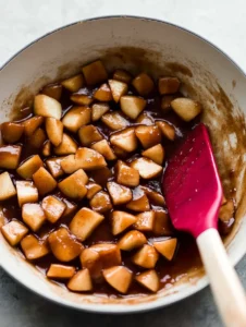 Easy Apple Hand Pies 34 apple-pie-filling-diced-apples-in-cinnamon-sugar-sauce-in-a-white-pan