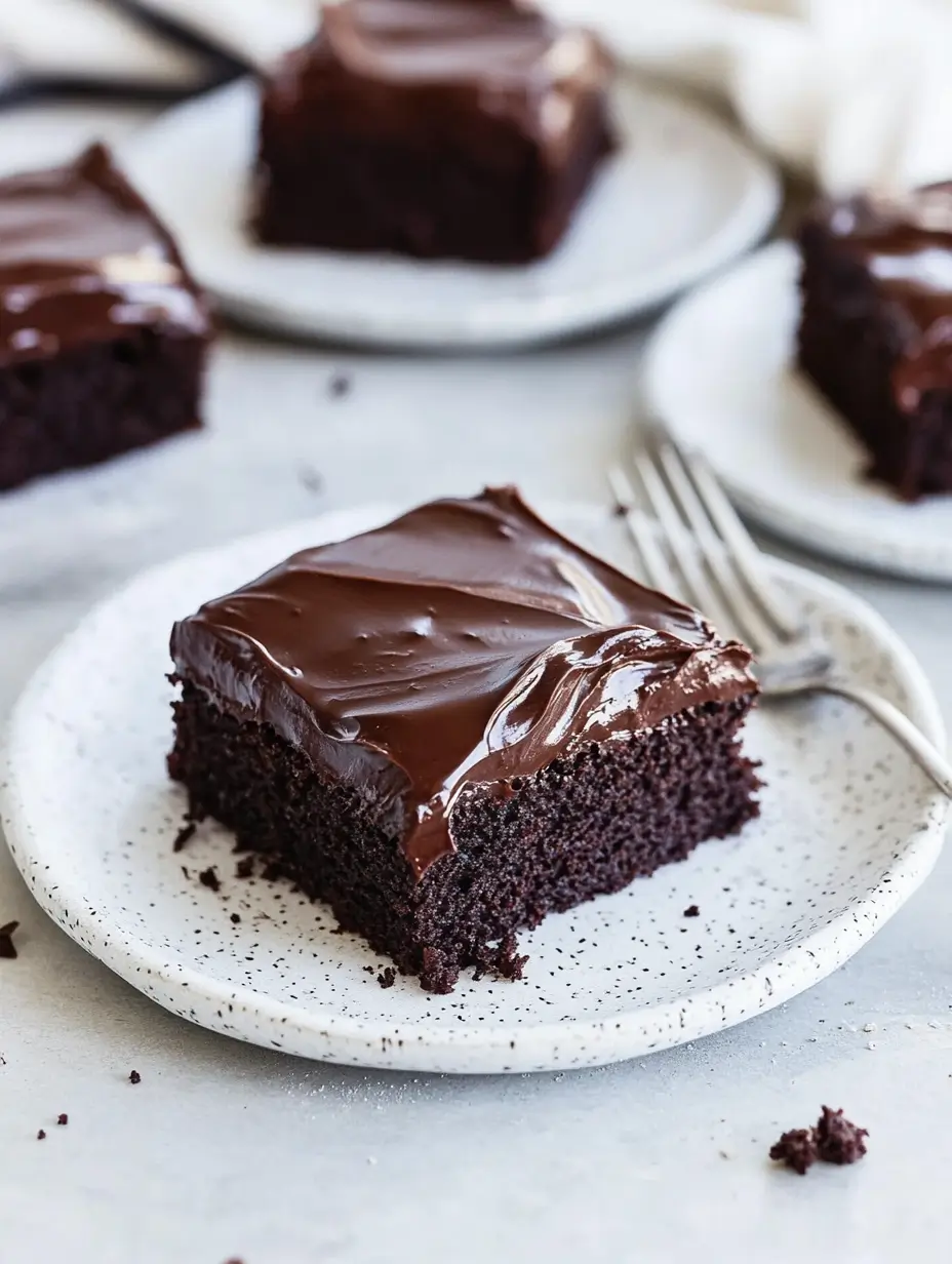 multiple-slices-of-chocolate-mayonnaise-cake-with-glossy-frosting