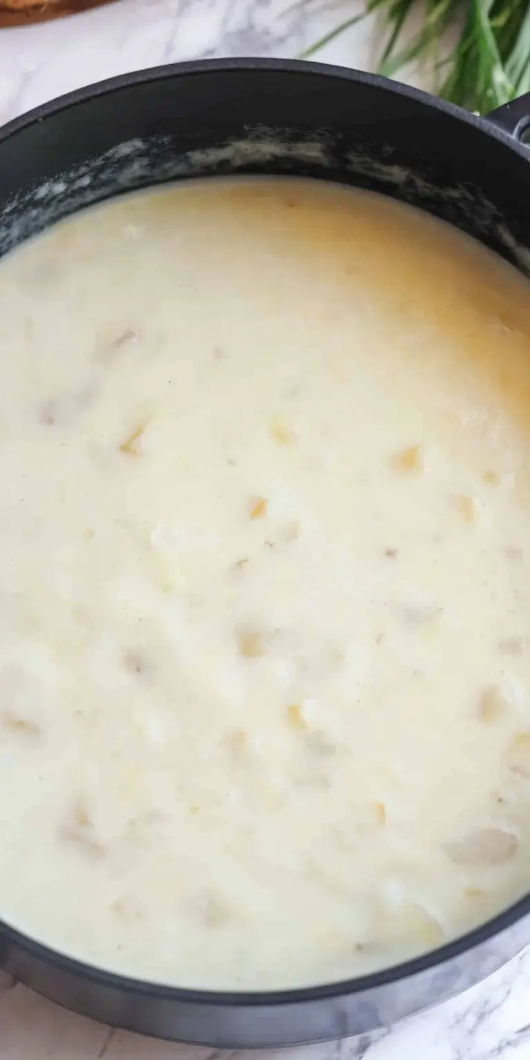 4 Ingredient Potato Soup 17 A-close-up-of-a-pot-filled-with-smooth-and-creamy-potato-soup-showing-its-velvety-texture