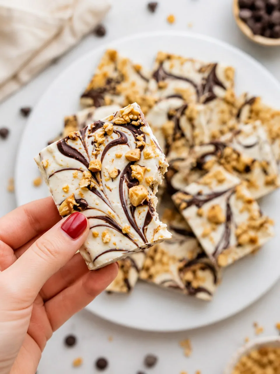 hand-holding-a-piece-of-cottage-cheese-bark