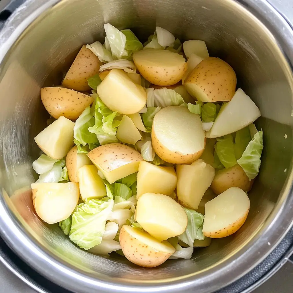Chicken Cabbage Soup for Quick Fat Burning 42 cabbage-and-potatoes-prepped-in-a-pot-before-cooking
