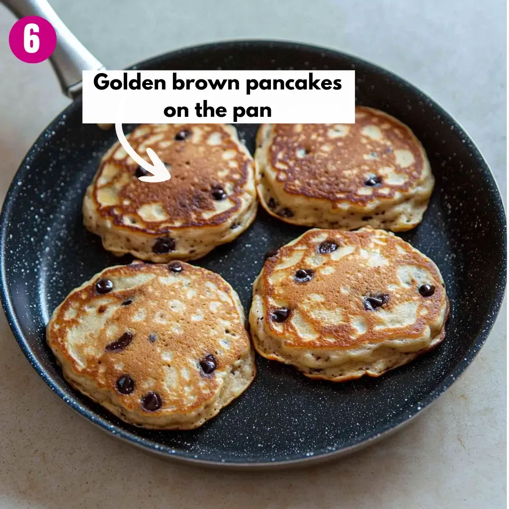 20-Minute Soft Banana Chocolate Chip Pancakes 17 Golden-brown-pancakes-on-the-pan