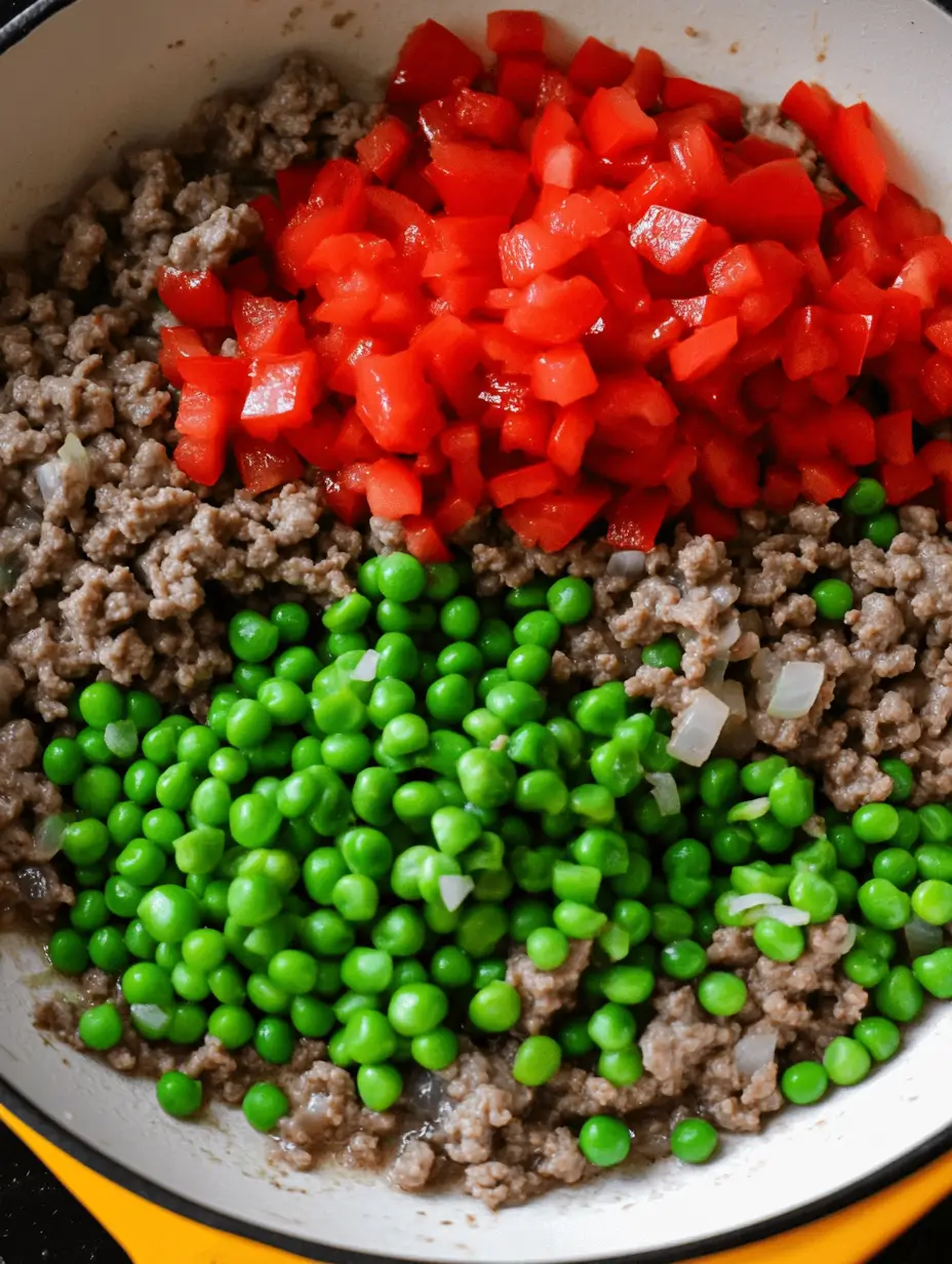 sautéed-meat-peas-and-bell-peppers-in-pan