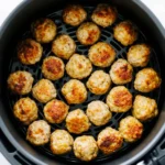 Ridiculously Good Frozen Meatballs in Air Fryer 10 air-fryer-basket-with-golden-frozen-meatballs