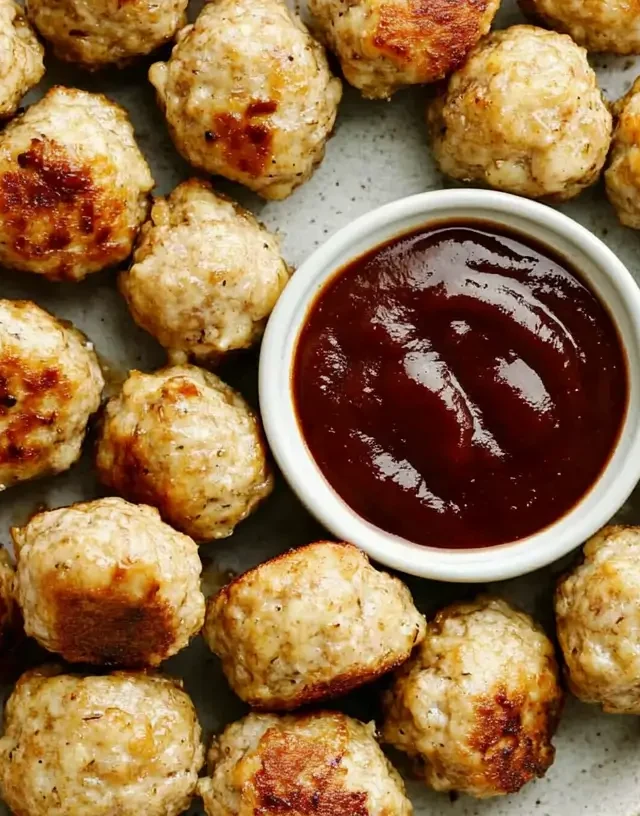 frozen-meatballs-on-plate-with-bbq-sauce-in-a-bowl