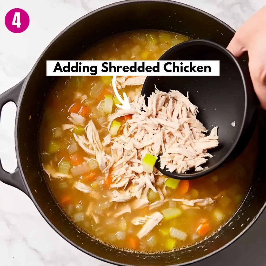Incredibly Easy Chicken Noodle Soup Recipe 16 Adding-Shredded-Chicken