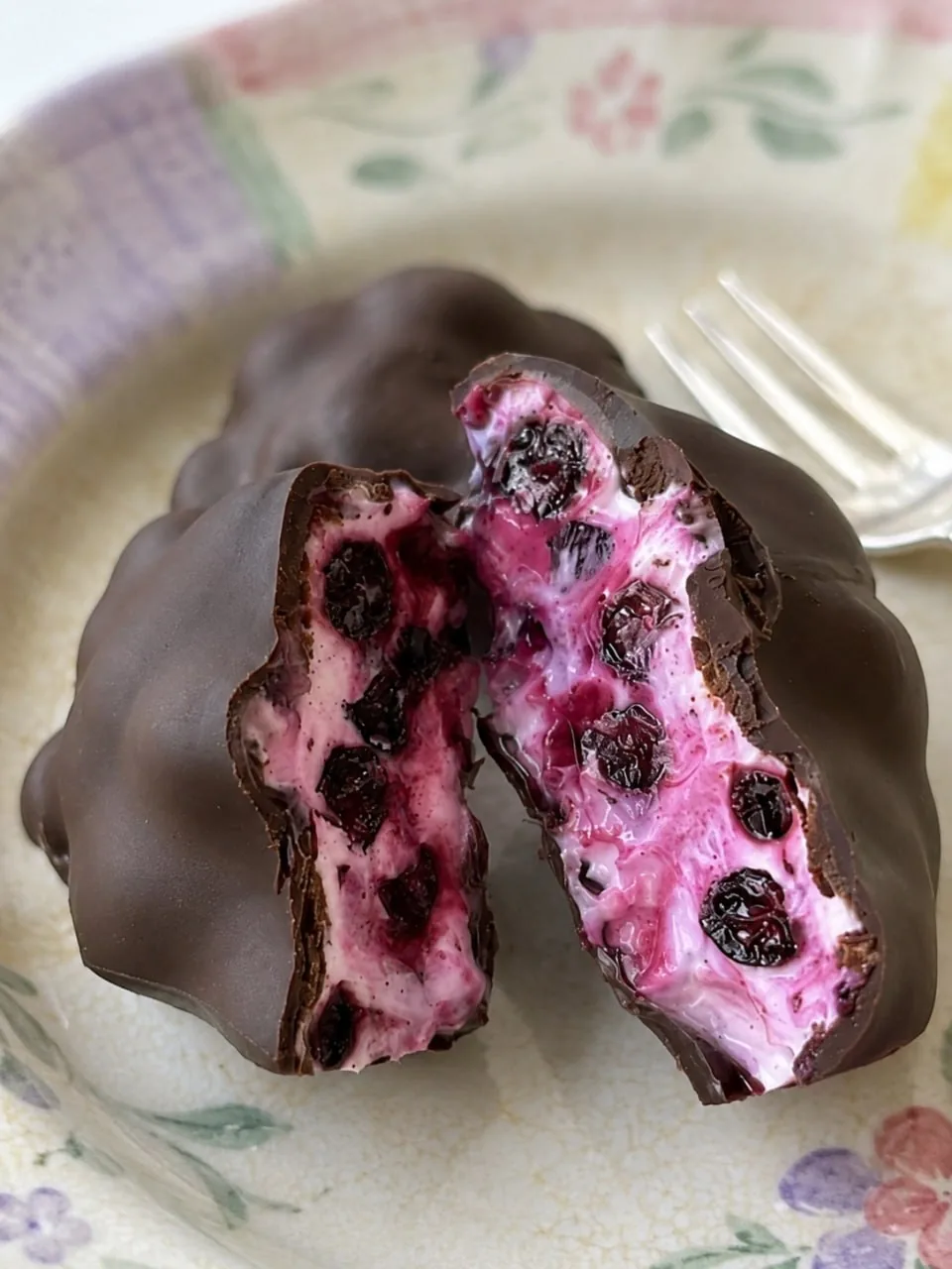 chocolate blueberry bite cut open showing creamy center