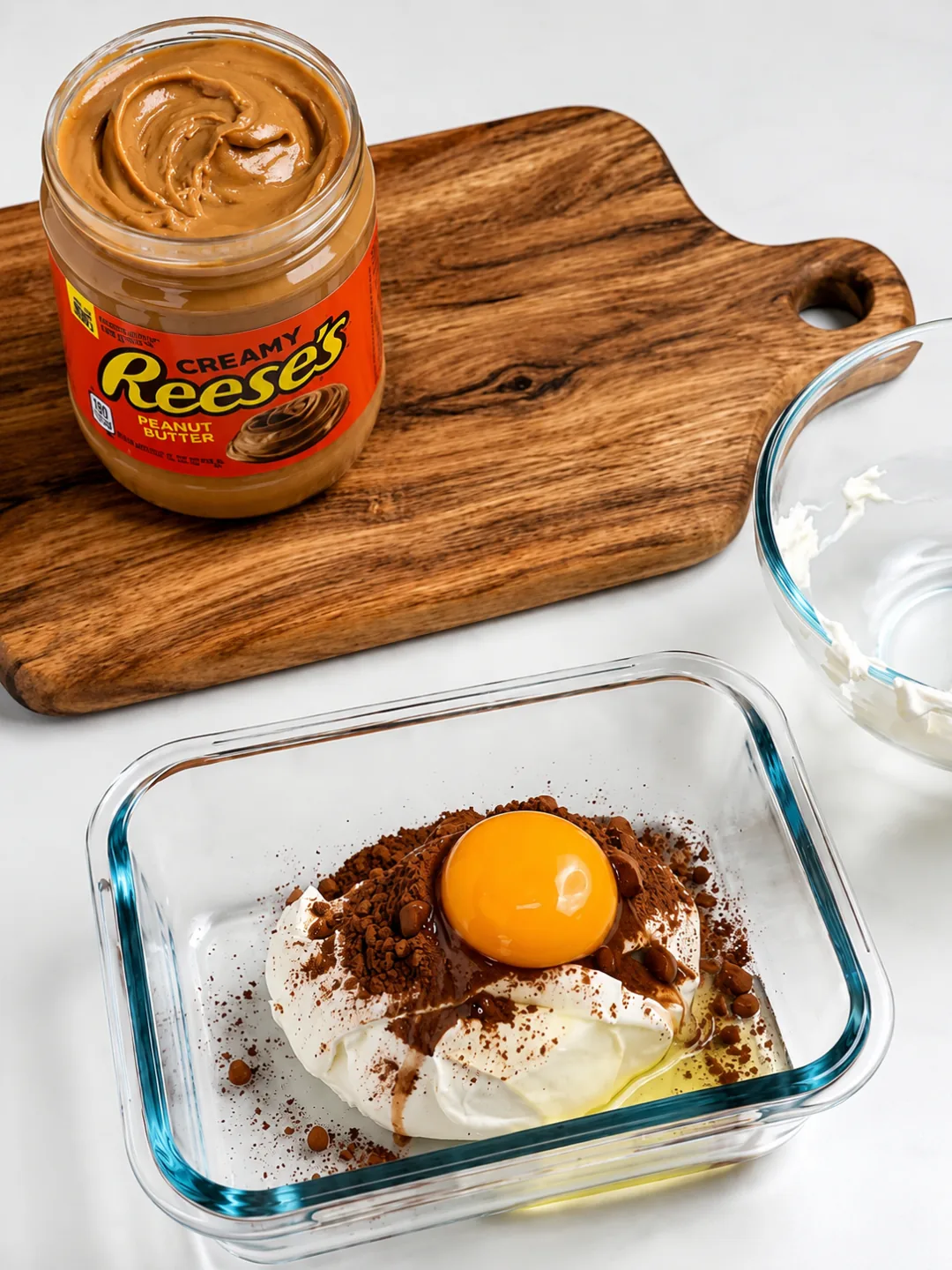 Protein Reese’s Cheesecake Recipe 1 Blending cream cheese Greek yogurt egg and sweetener until smooth for Protein Reeses Cheesecake