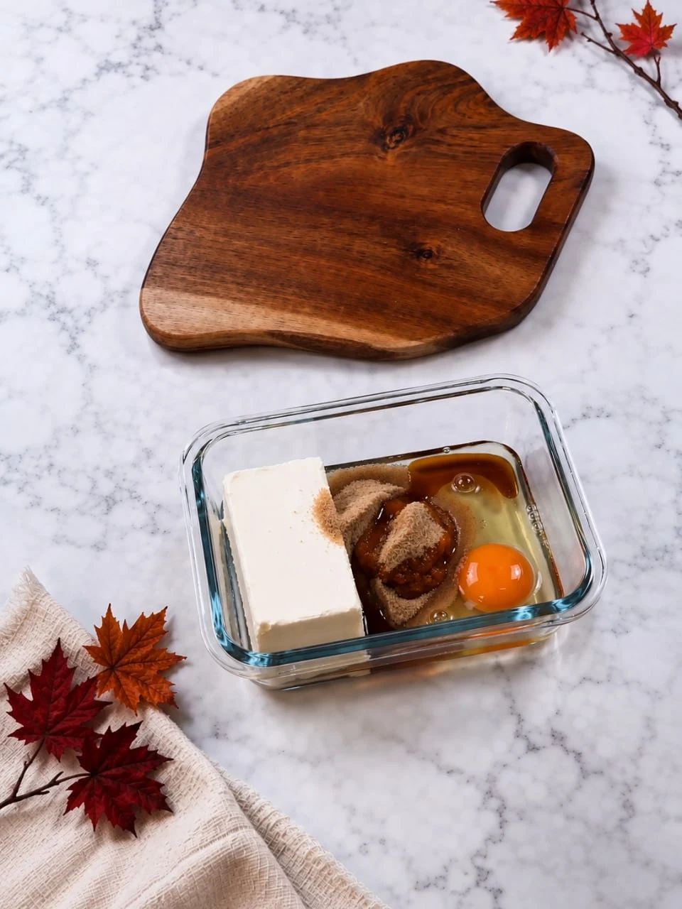 pumpkin-pie-cheesecake-ingredients-in-glass-dish